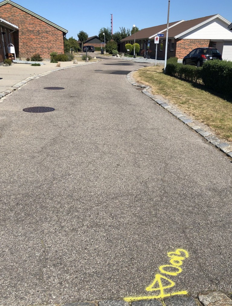 Renovering af vejbelægning i villakvarter